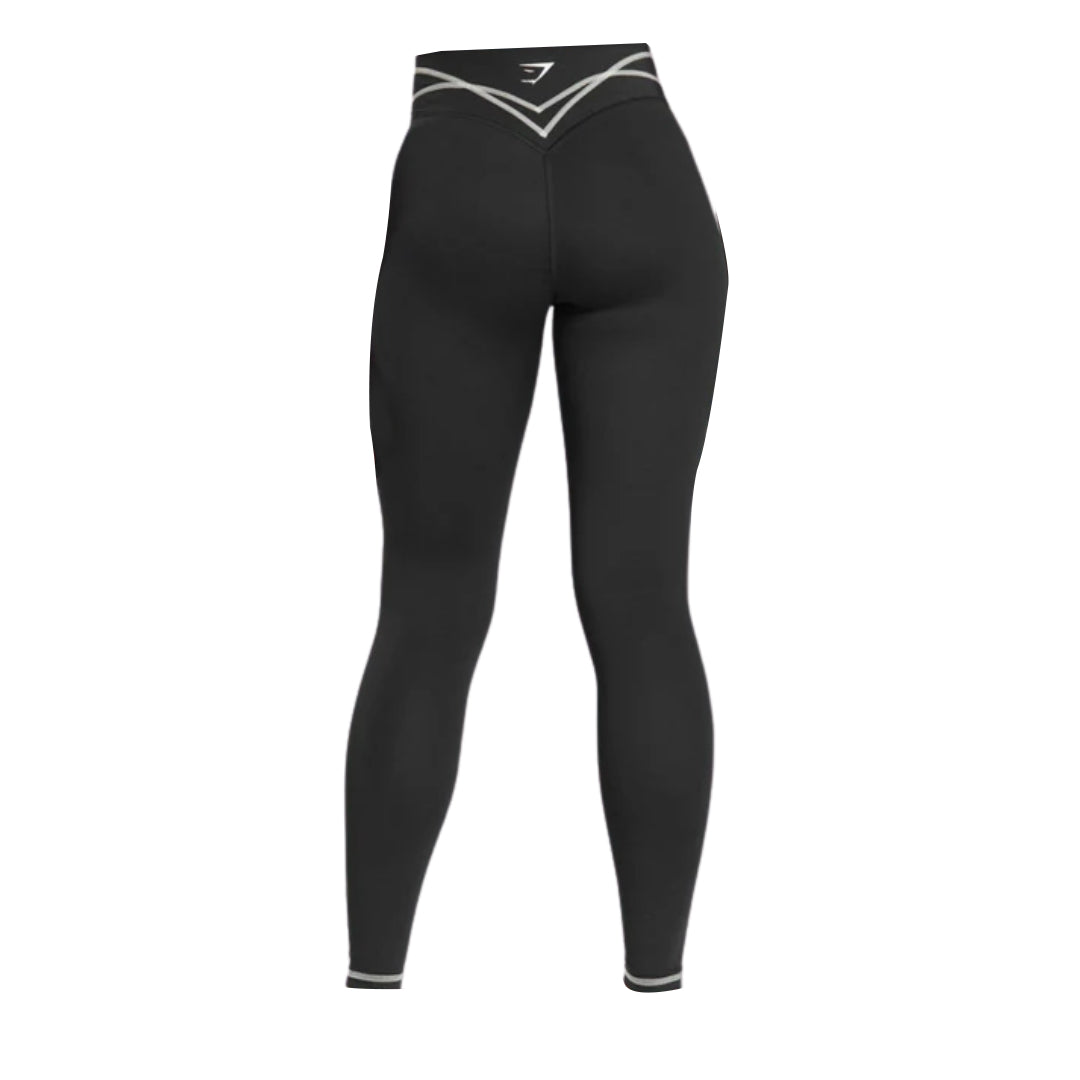 Back view of Gymshark stitch feature leggings in black, with silver detailing on the waistband, and a Gymshark logo.