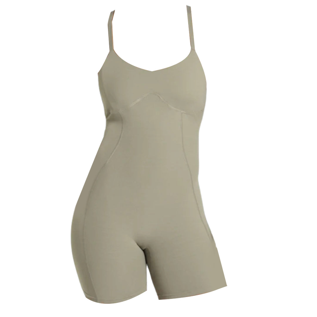 Gymshark beige bodysuit with thin straps and a fitted design, featuring a scoop neckline and shorts-style bottom.