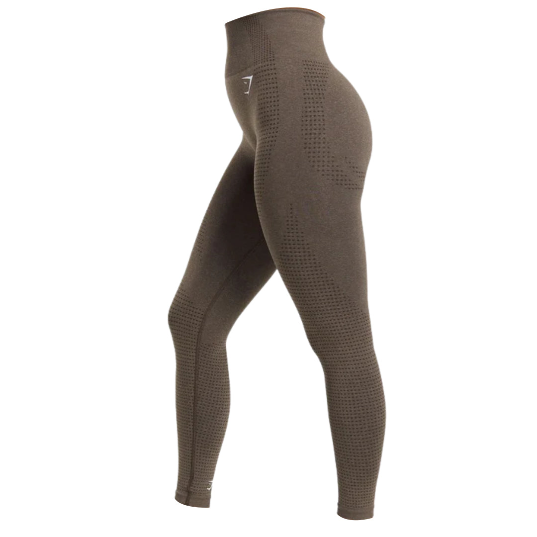 Olive green high-waisted leggings with textured paneling and a logo, designed for activewear and comfort.