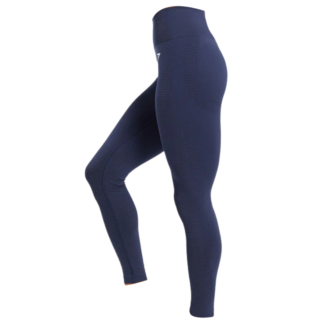 Navy blue high-waisted leggings with textured design, ideal for workouts or casual wear. Side view showcases their form-fitting style.