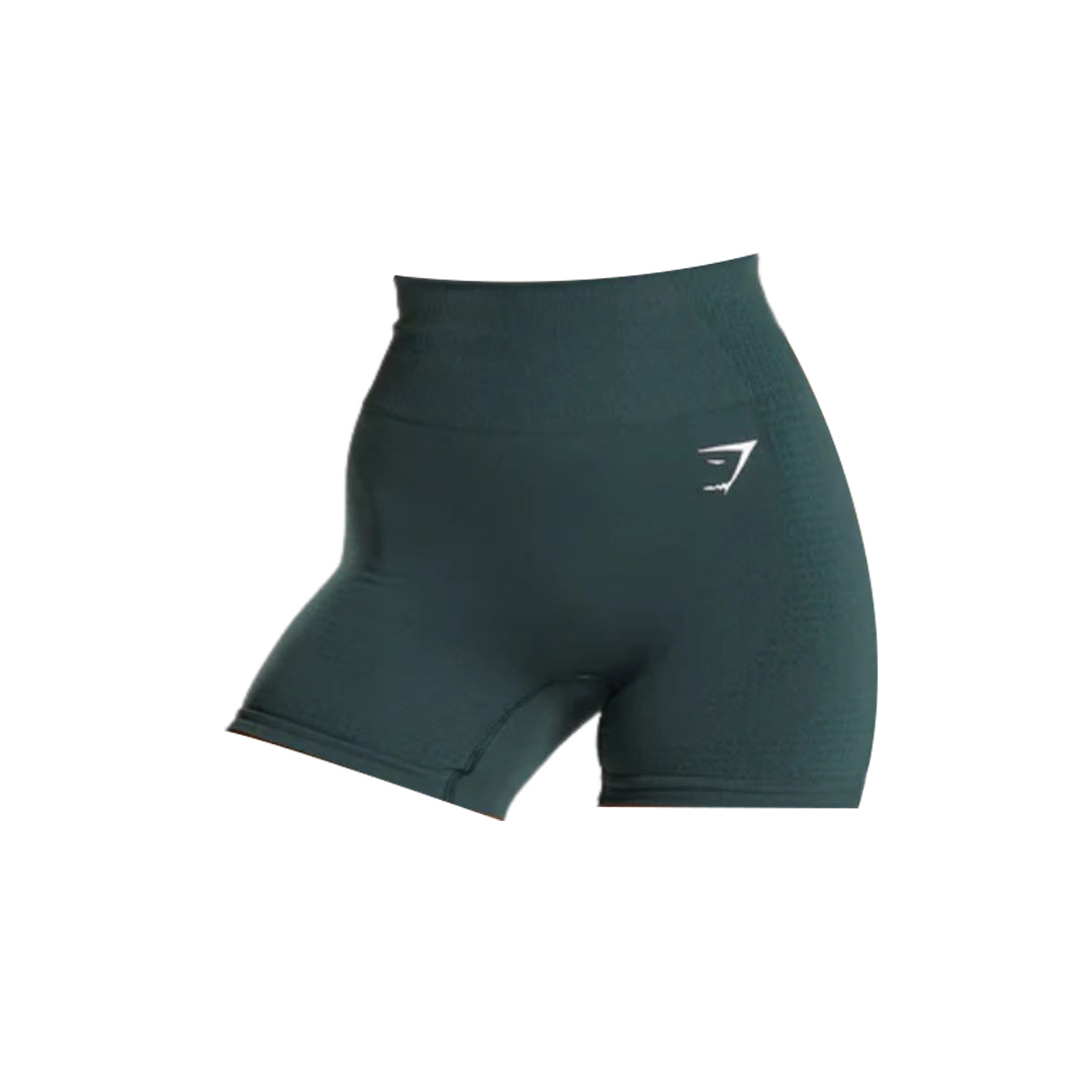 Gymshark Vital Seamless 2.0 Shorts in dark green, featuring a high ribbed waistband and a small white Gymshark logo on the left hip.