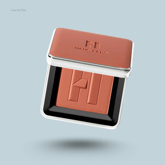 Haus Labs Color Fuse Talc-Free Powder Blush in Fire Moon, presented in sleek, square packaging featuring the "H" logo.