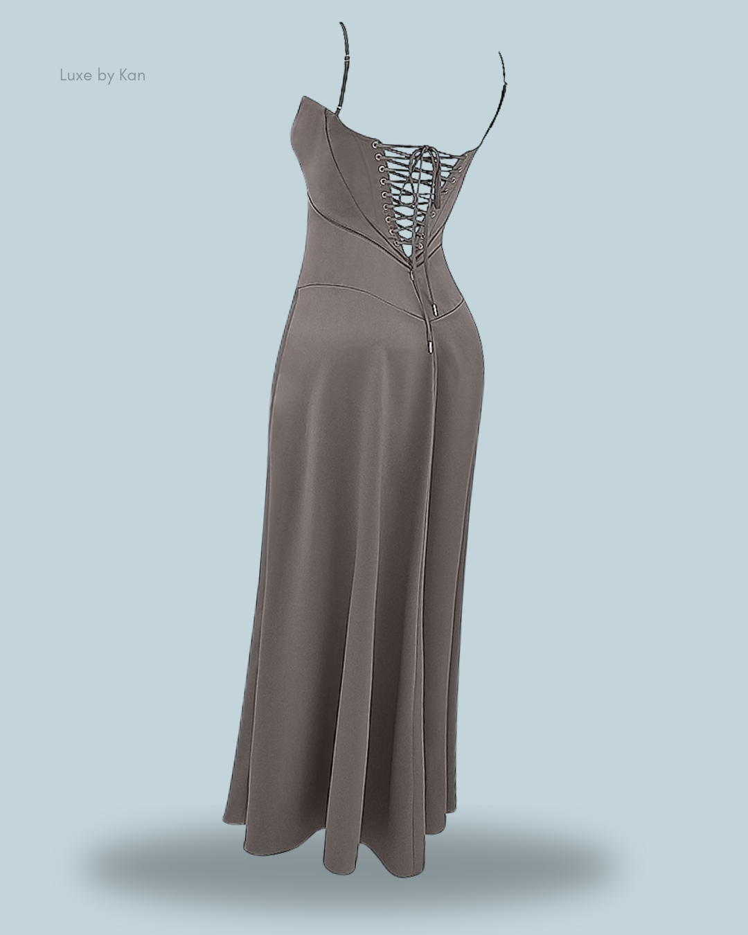 Gray House of CB Anabella lace-up maxi dress featuring a lace-up back, thin straps, a fitted bodice, and a flowing skirt for an elegant silhouette.