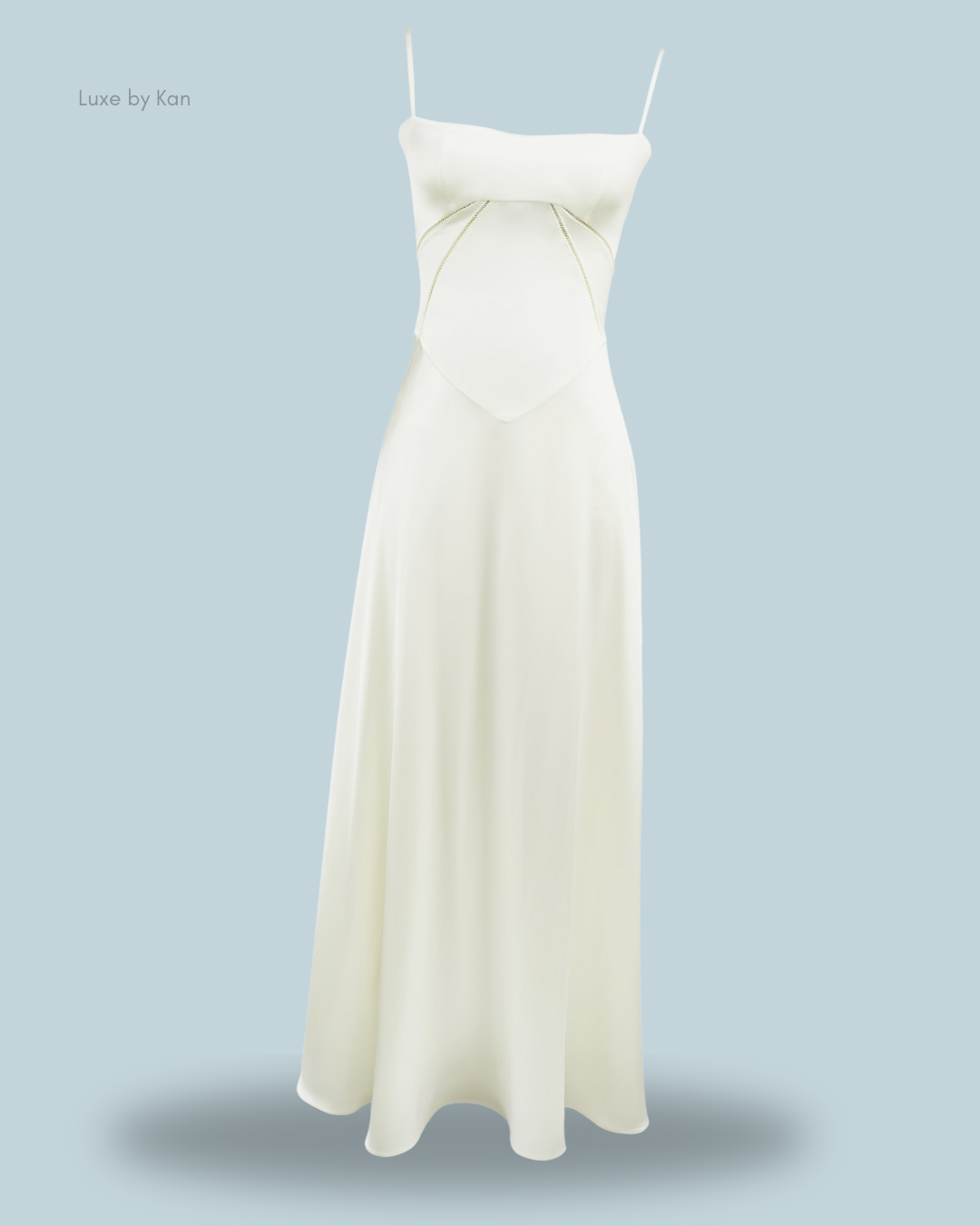 House of CB ivory maxi dress with thin straps and delicate chain detailing.