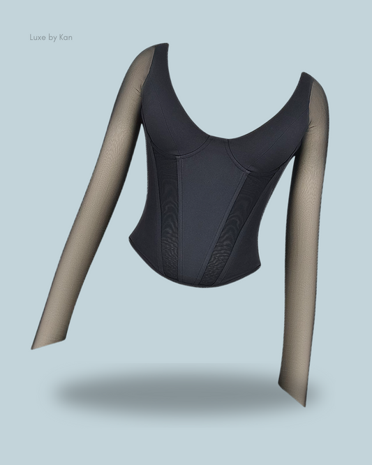 House of CB Araminta corset featuring a plunging neckline and sheer long sleeves.