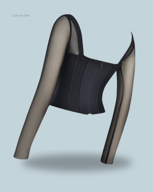A stylish black araminta corset with long sleeves, highlighting its modern design.