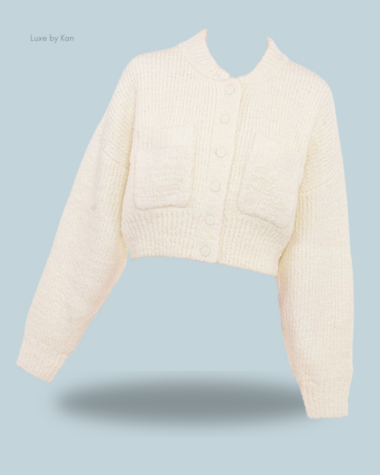 House of cb salilah cream chenille blend bomber jacket with two front pockets, textured knit pattern, and button closure.