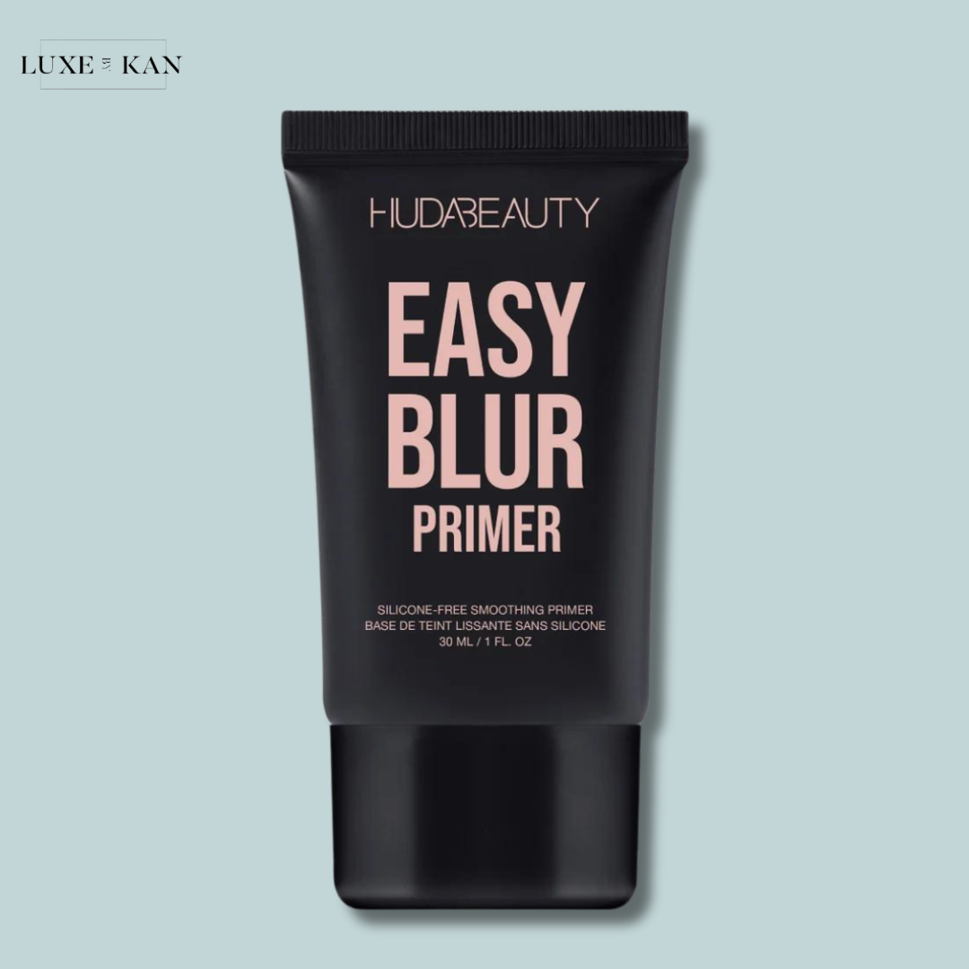 A black tube of Huda Beauty Easy Blur Primer, labeled as silicone-free and for smoothing.
