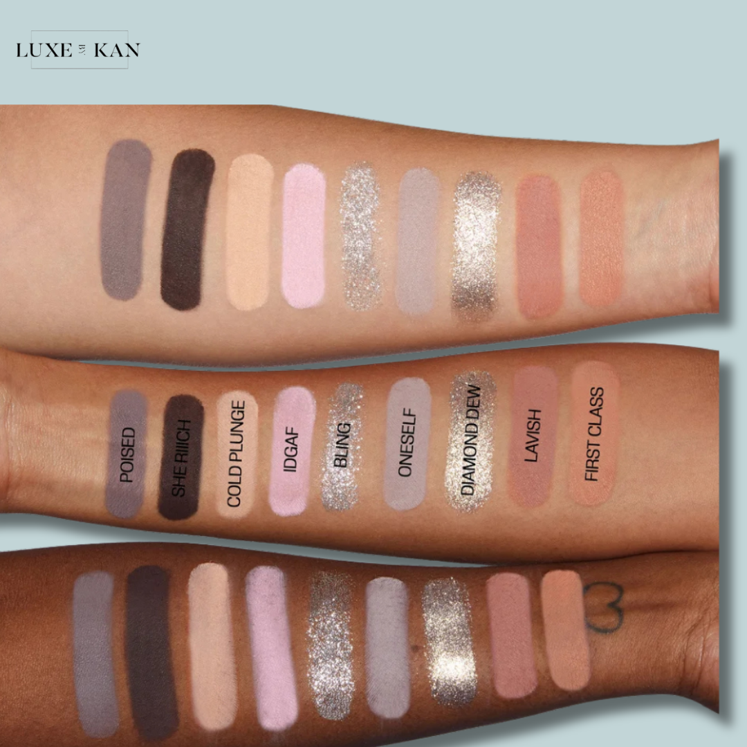 Image shows swatches of eyeshadows on arms in varied skin tones, labeled with names like "First Class," "Lavish," and "Diamond Dew."
