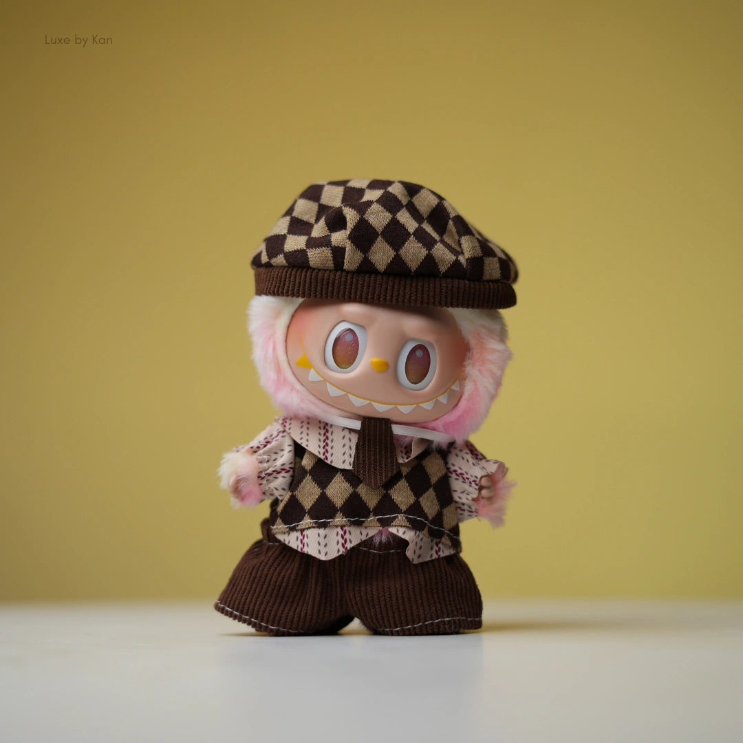 Labubu doll collectible outfit mocha scholar set shows brown hat, diamond vest, patterned shirt, tie, and corduroy pants.