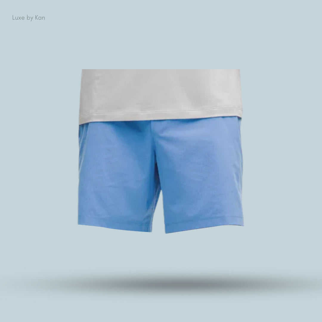 Light blue Zeroed In Linerless Short 7" paired with a white top, set against a soft blue background to emphasize a casual, stylish look.