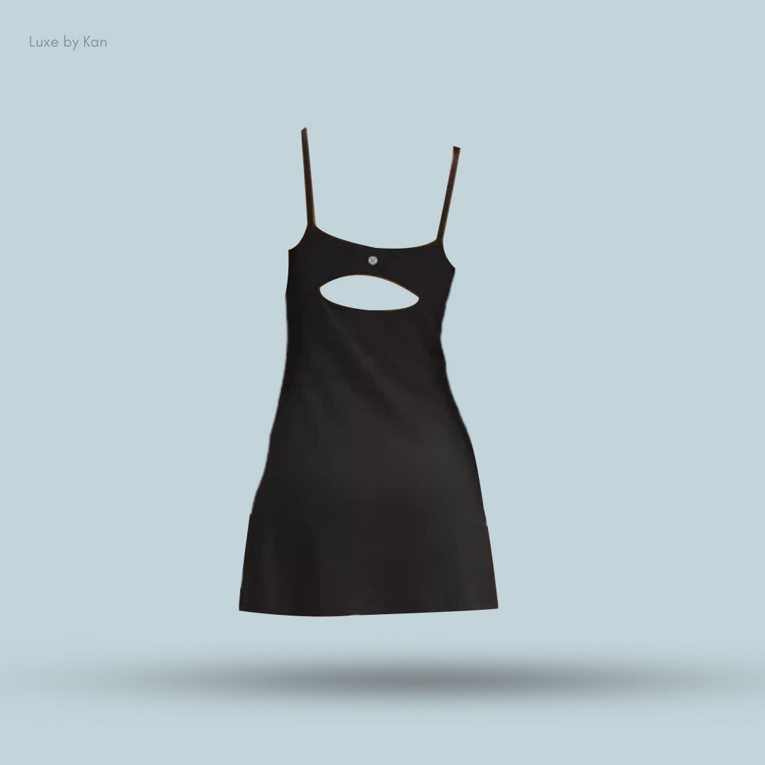 A minimalist black Lululemon Align™ Cami Strap Dress featuring thin straps and a circular cutout detail at the back.