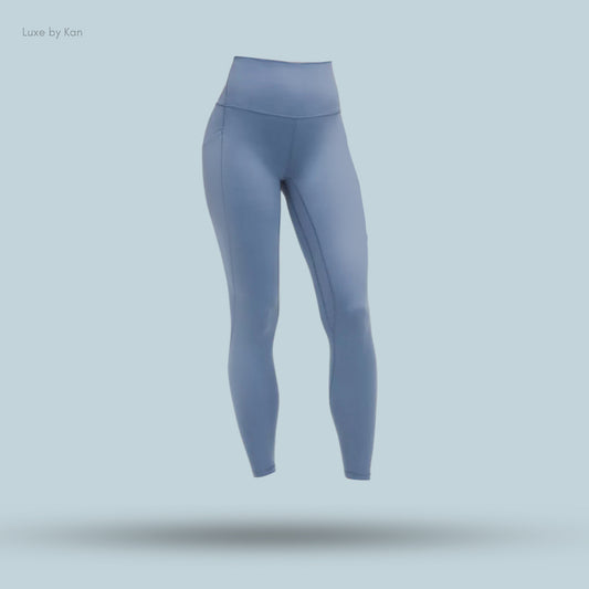 Light blue Lululemon Align™ High-Rise Pant with Pockets 28", featuring a sleek design ideal for activewear.