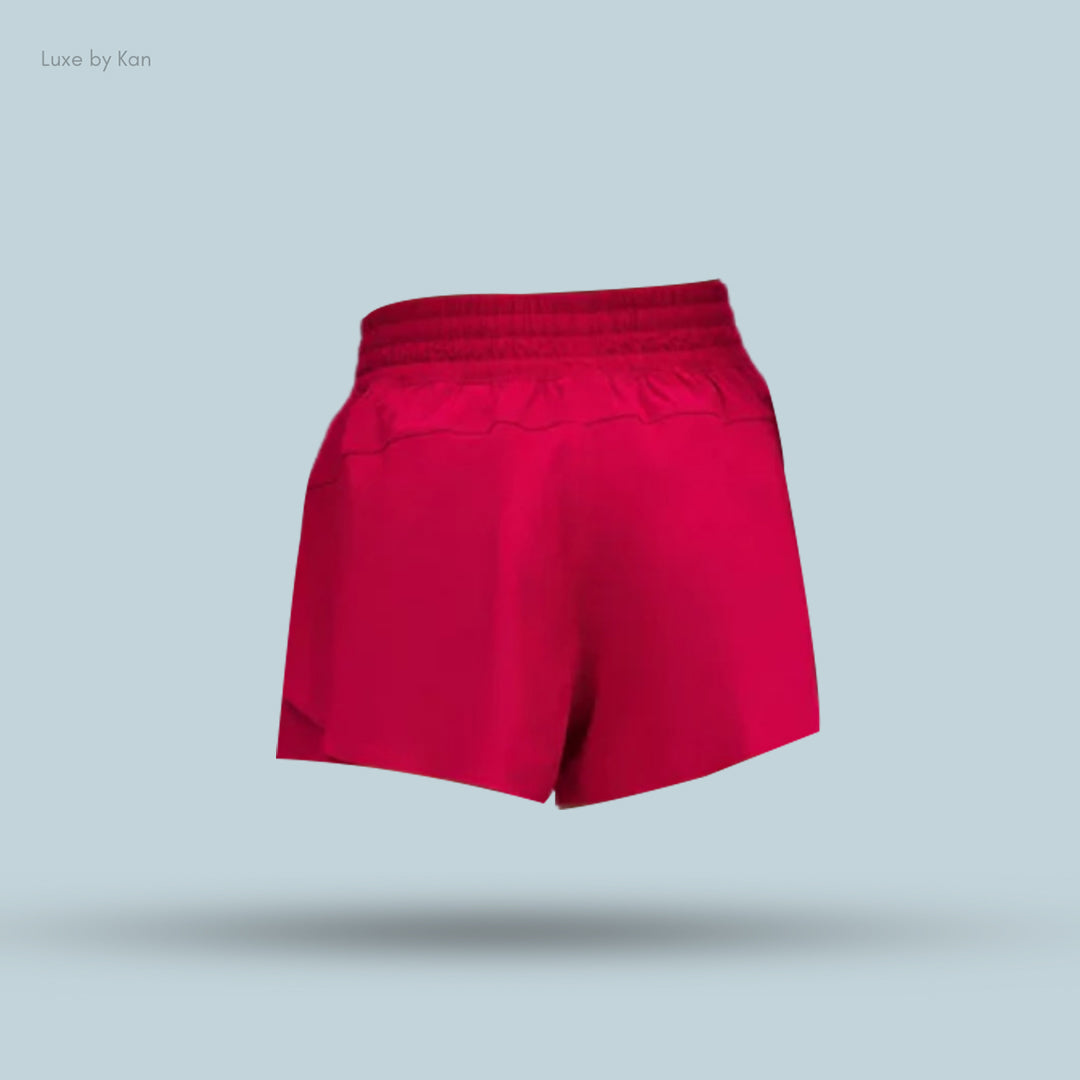 Bright red Lululemon Shake It Out High-Rise Running Shorts 2.5", featuring a comfortable elastic waistband and a stylish cut.
