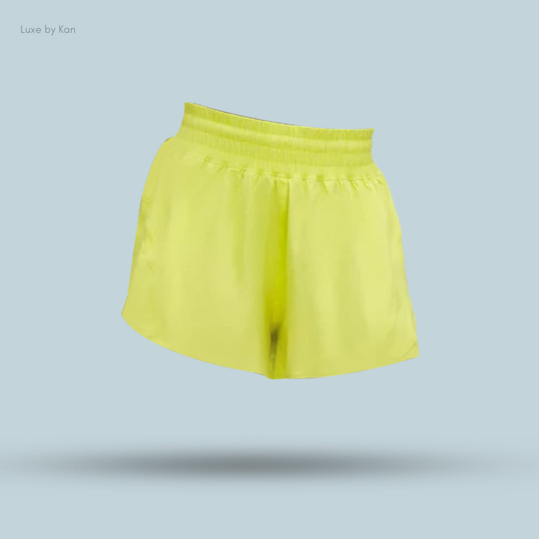 Bright neon yellow sports shorts with an elastic waistband.