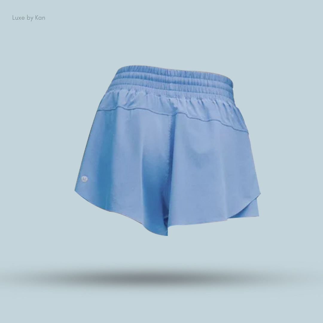 Light blue athletic shorts with an elastic waistband.