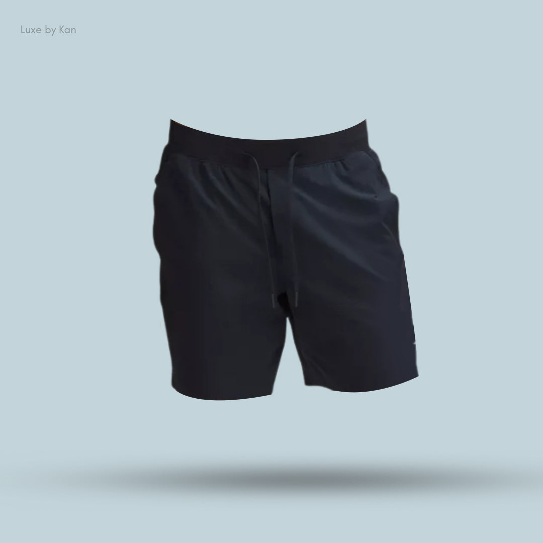 Black Zeroed In Linerless Short 7" with a drawstring waist, displayed against a light blue background, showcasing a modern and sleek design.