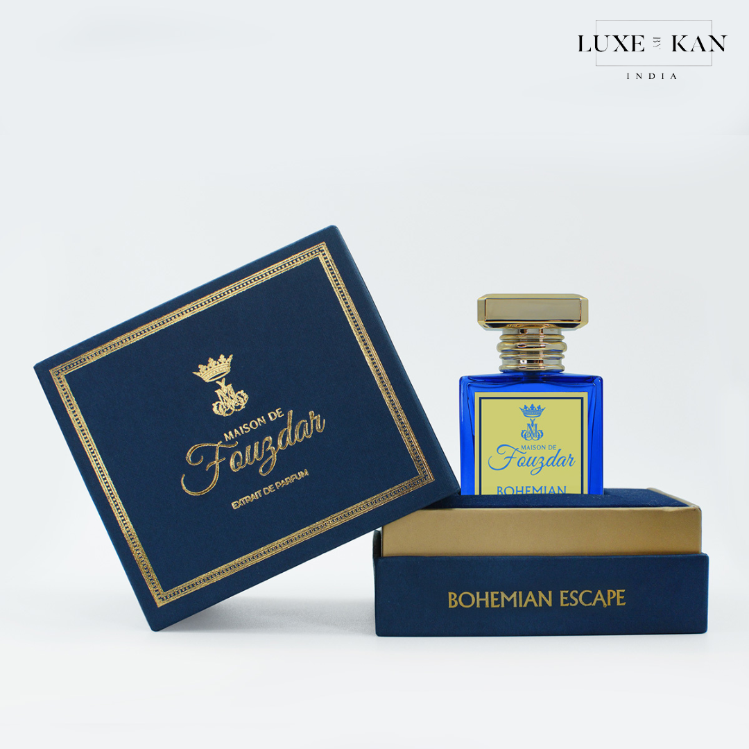 Blue perfume bottle labeled "Maison de Fauzdar - Bohemian Escape," displayed in an elegant navy box with gold accents.