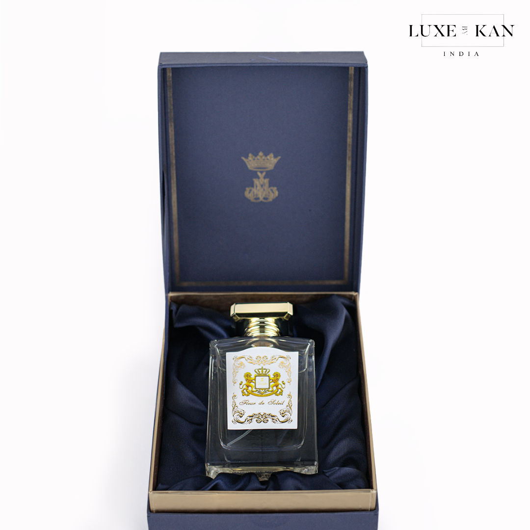 Maison de fouzdar fleur de soleil perfume bottle inside the navy blue box.