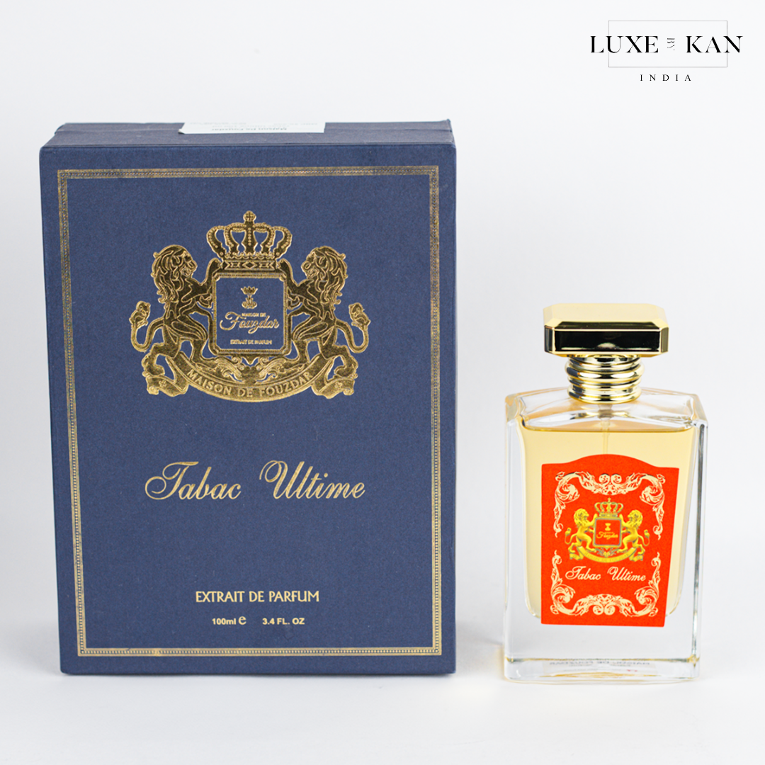 Maison de fouzdar tabac ultime perfume bottle next to its elegant blue box.