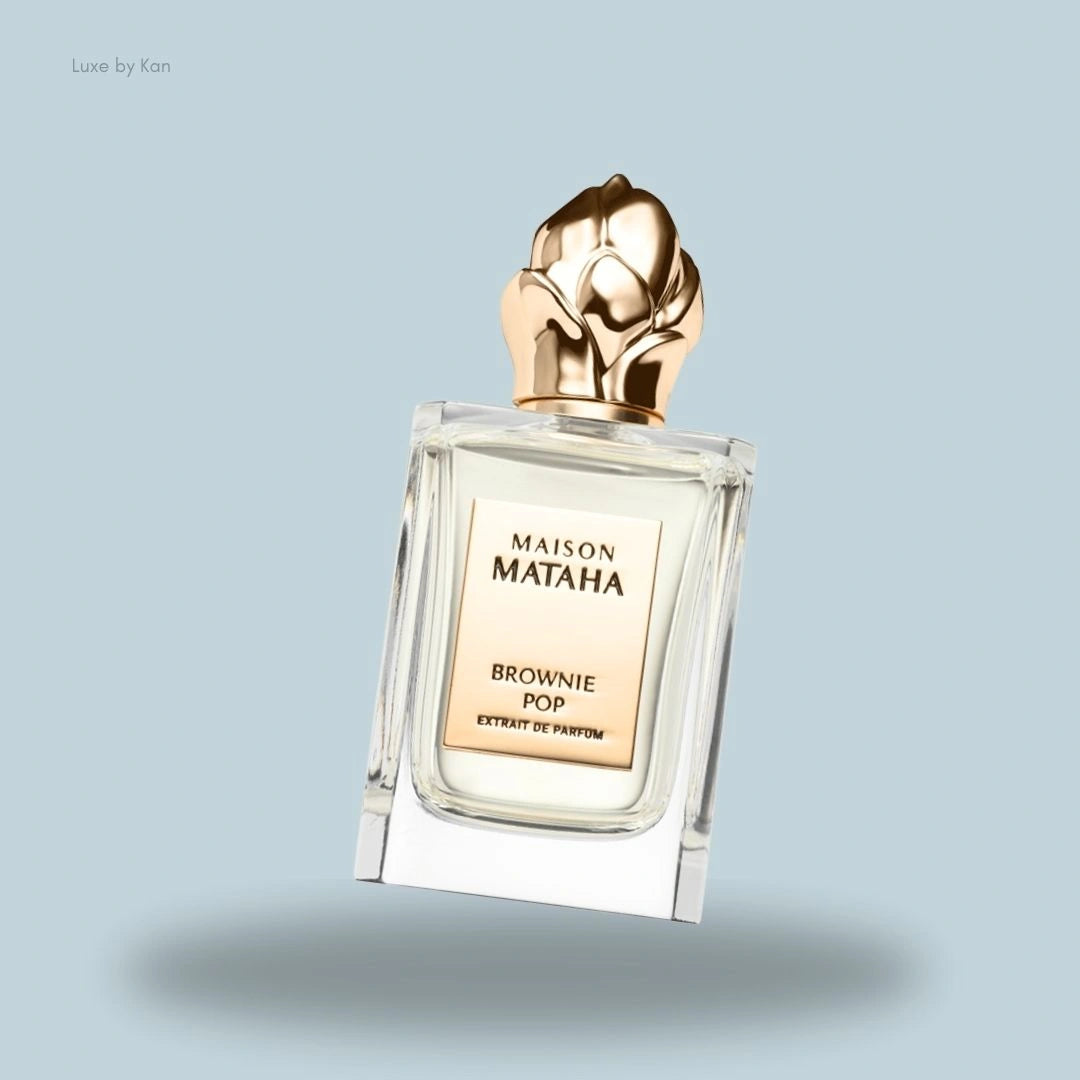 Maison Mataha Brownie Pop Extrait de Parfum, featuring a clear glass bottle and a gold cap.