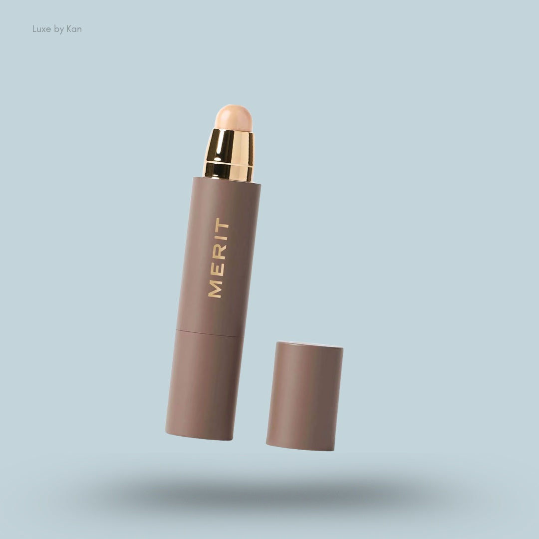 Merit Beauty's "the Minimalist" complexion stick, with cap removed.