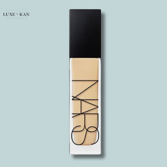 NARS radiant foundation tube with a sleek design, featuring a black cap and clear base.