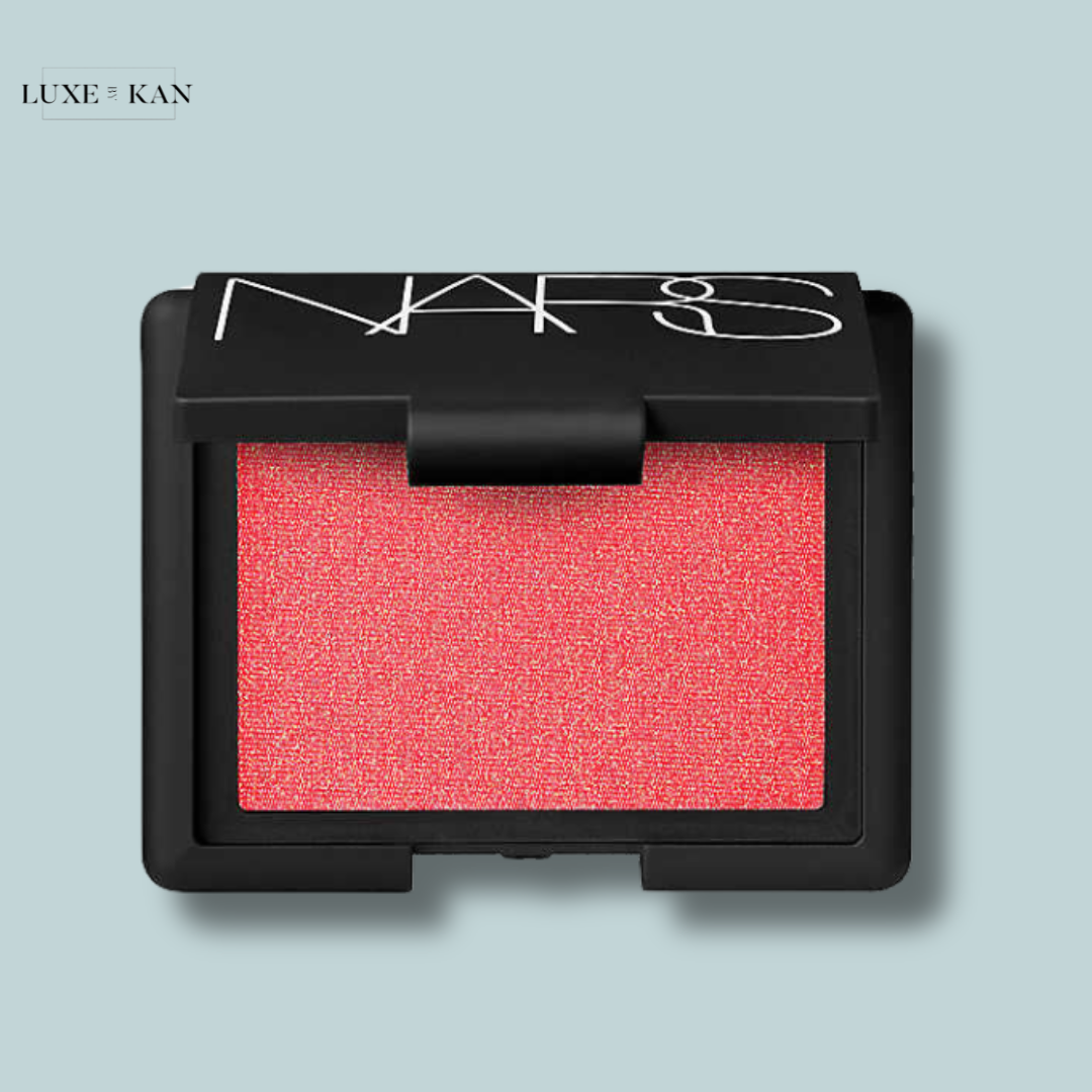 Close-up of a NARS blush compact featuring a vibrant pink shade.