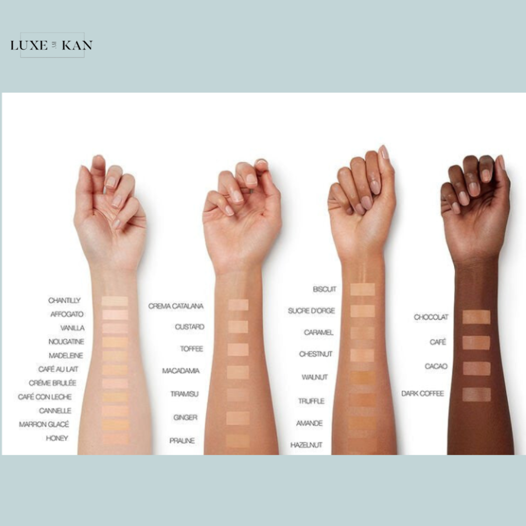Four diverse skin tone arms displaying various cosmetic shade swatches, labeled with dessert-inspired names.