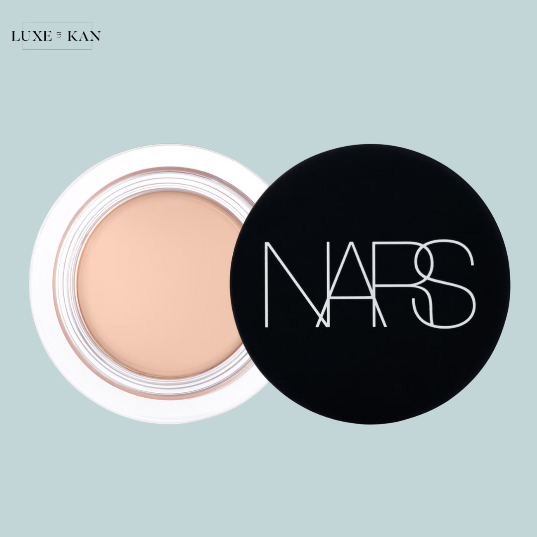 Open NARS cream foundation pot with a light beige shade.