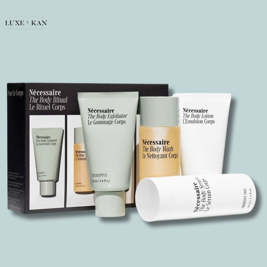 Nécessaire’s Body Ritual set includes exfoliator, body wash, lotion, and serum, elegantly packaged for body care.