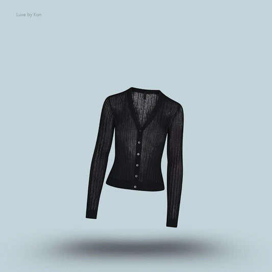 SKIMS Sheer Knit Cardigan in Onyx, flat lay on light blue background