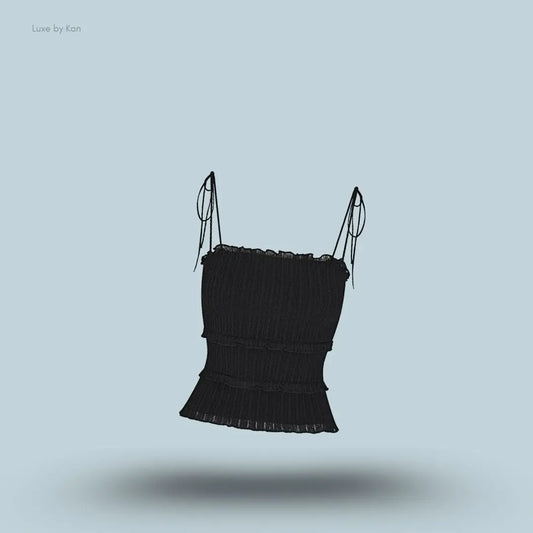 SKIMS Sheer Knit Ruffle Cami in Onyx, flat lay on light blue background