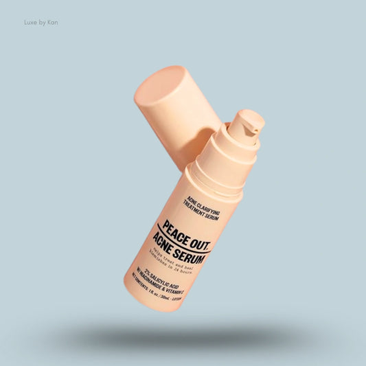 Beige bottle of Peace Out acne clarifying treatment serum with the product cap removed showing the pump.