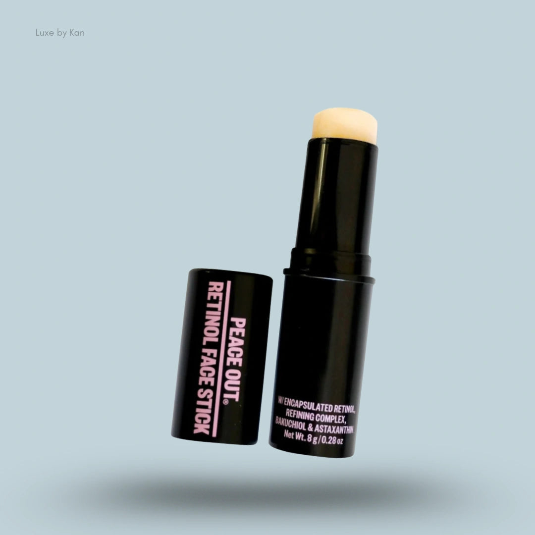 Peace Out retinol face stick with its cap off, revealing the solid retinol product.