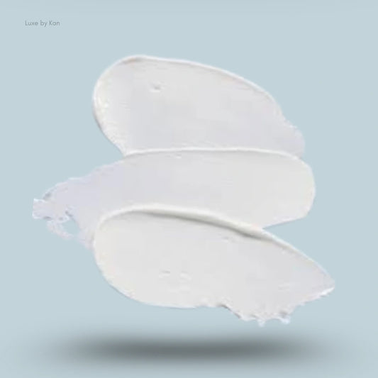 Close-up of three smears of Peter Thomas Roth Water Drench Hyaluronic Cloud Hydrating Body Cream.