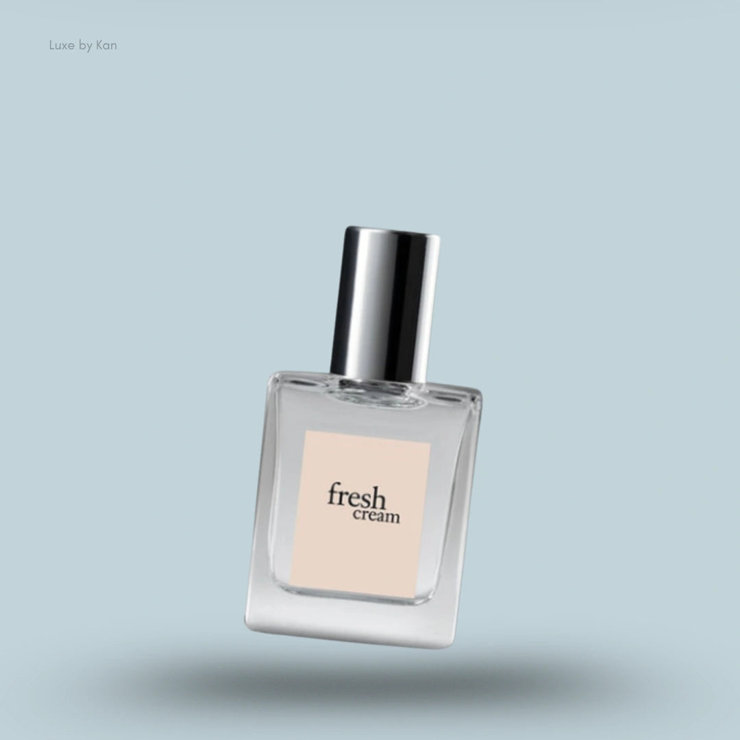 Philosophy Fresh Cream eau de toilette in a square glass bottle with a silver cap, label that reads "fresh cream philosophy: every day brings joy".