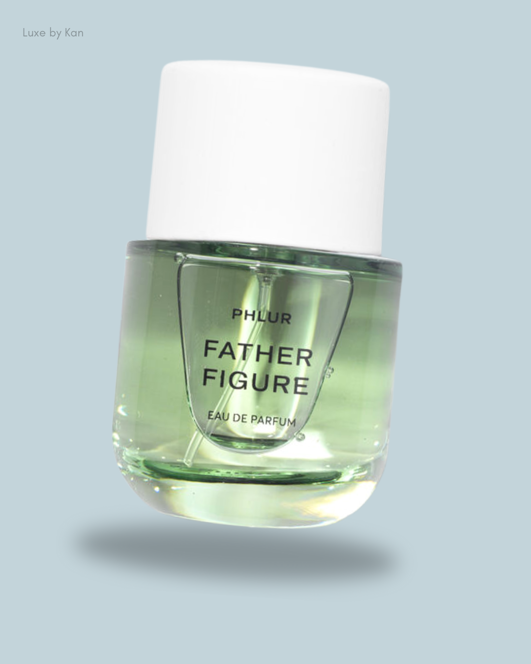 Phlur's Father Figure fragrance bottle, featuring a sleek green design with a white cap.