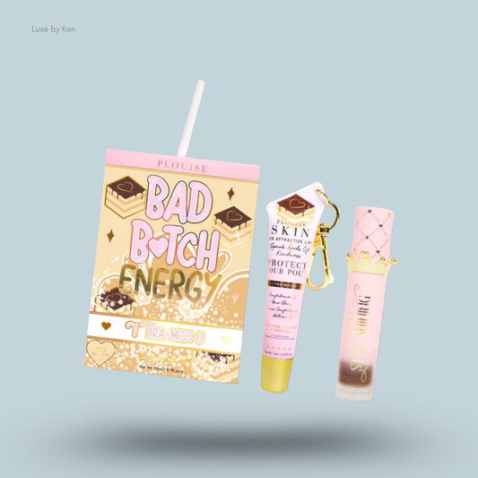 Plouise Bad Bitch Energy lip duo, with packaging resembling a juice box with a straw and containing a lip mask and lip plumper.