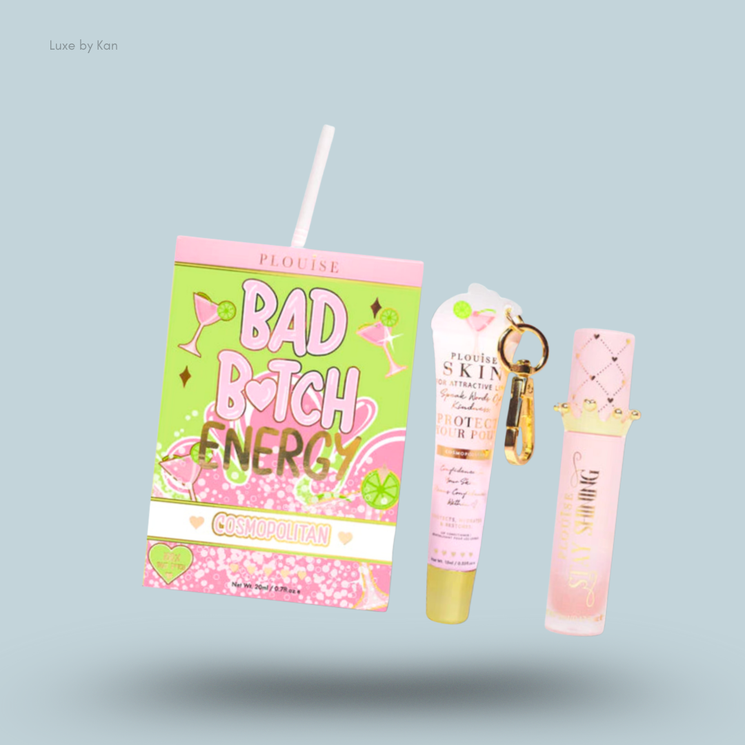 Plouise bad bitch energy lip duo, includes a juice box style container with a straw, lip balm with a gold keychain, and a lipstick.