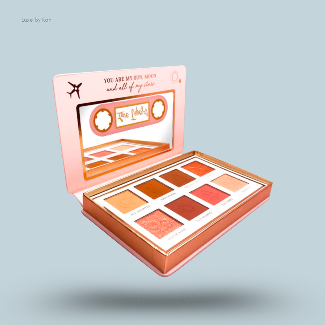 Plouise Love Tapes Palette in Baecation, with eight warm-toned shades arranged in a rectangular case resembling an open cassette tape.