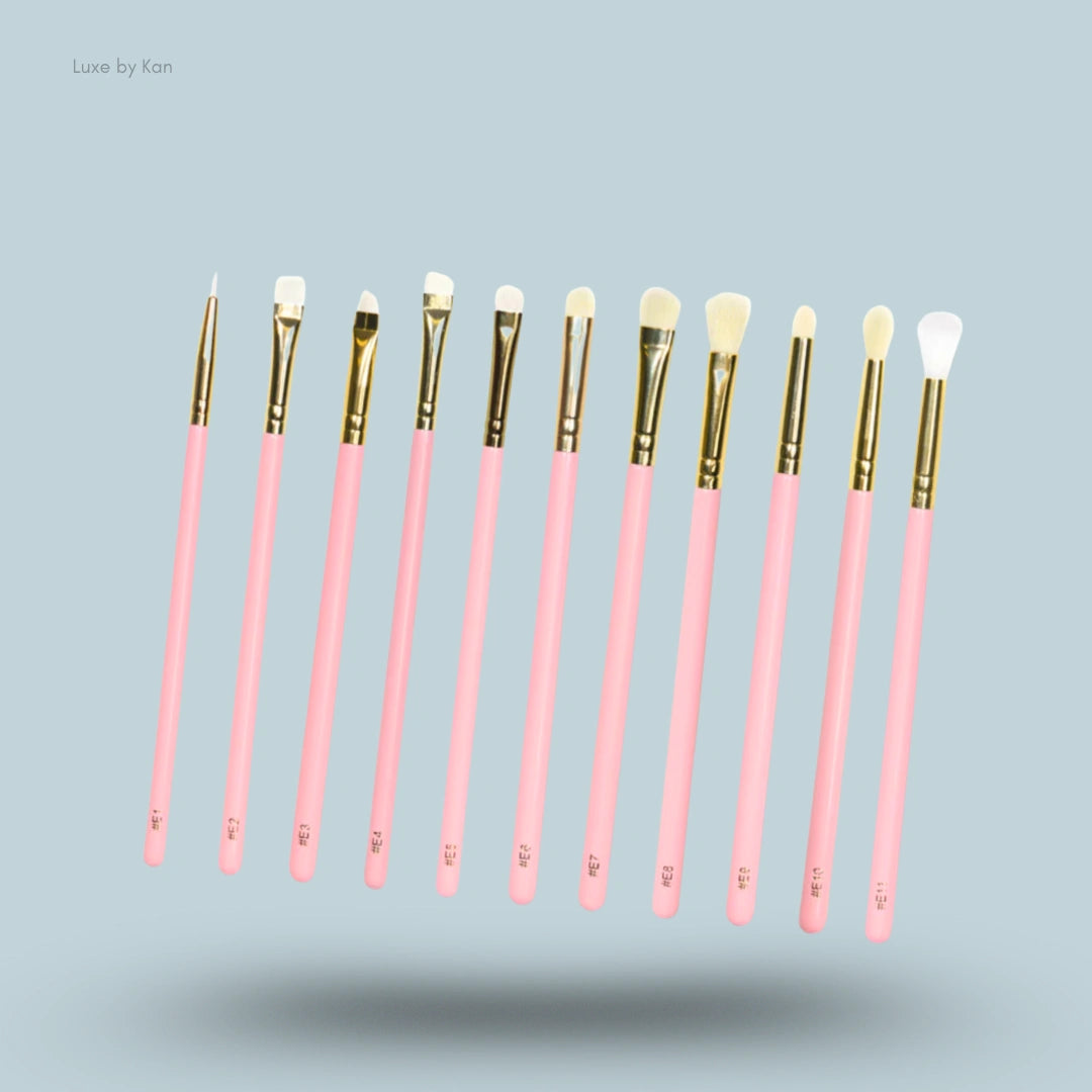Plouise precise with my destiny brush set, featuring eleven brushes with pink handles and gold ferrules.