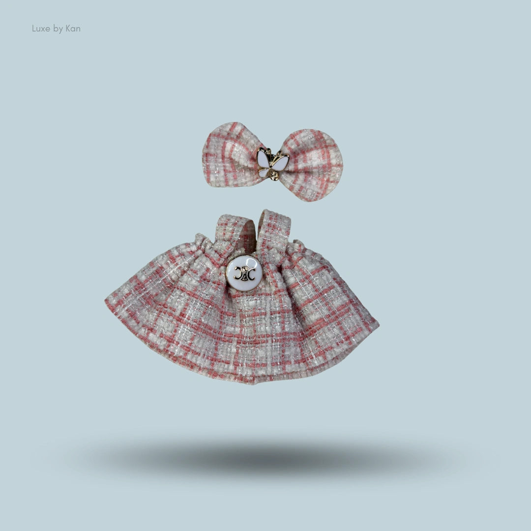 Tweed dress with bow for Pop Mart Labubu doll featuring pink and white plaid pattern.