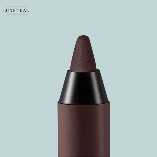 Close-up of a prada brow pradalines eyeliner pencil with a pointed tip.