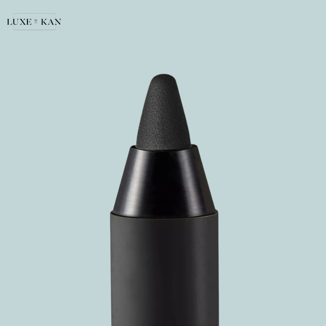 Close-up of a black makeup pencil tip.