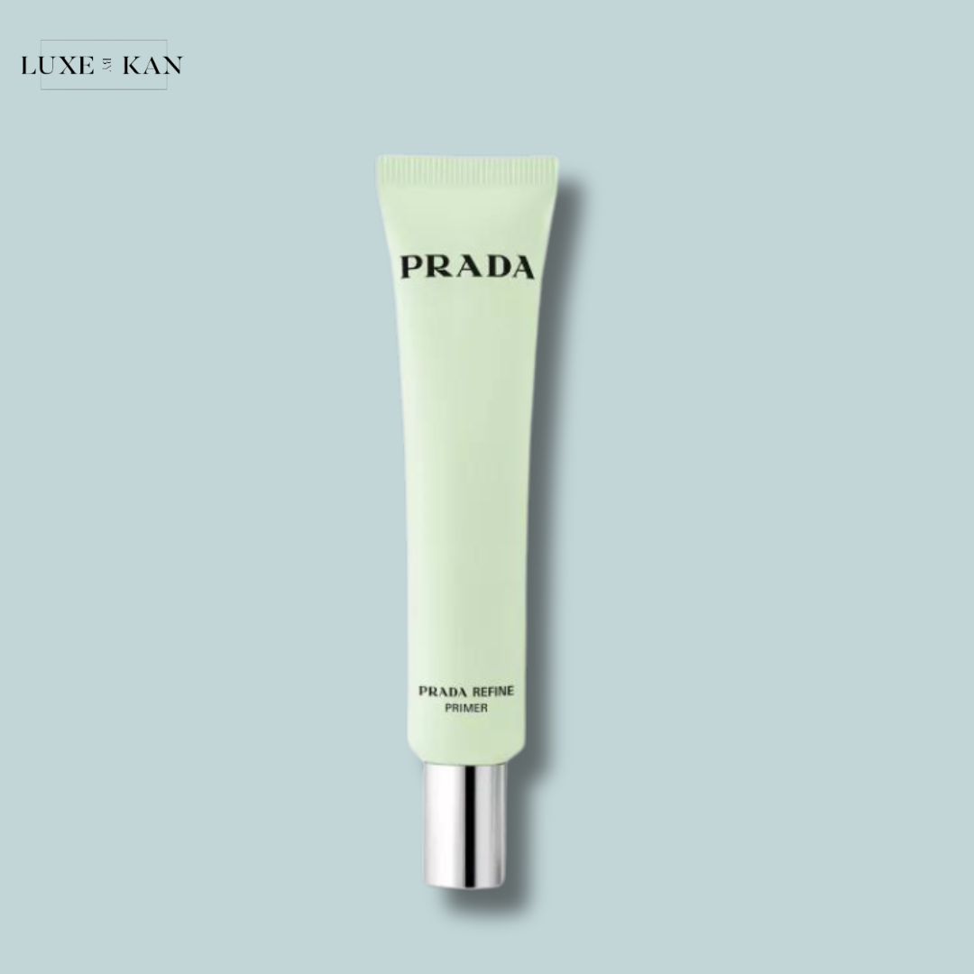A mint green tube of Prada refine blurring extending primer with a silver cap.