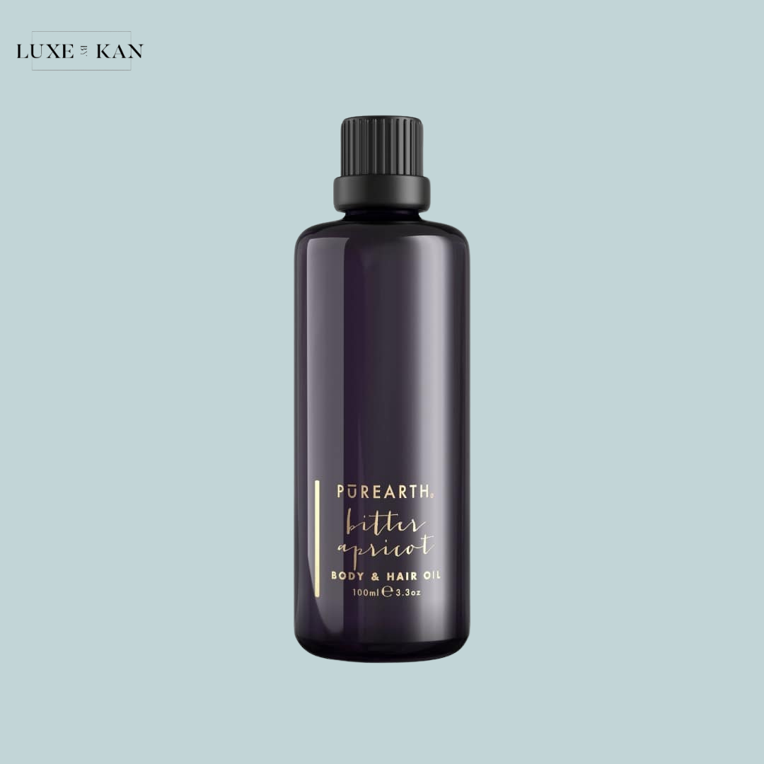 Purearth bitter apricot body & hair oil bottle.