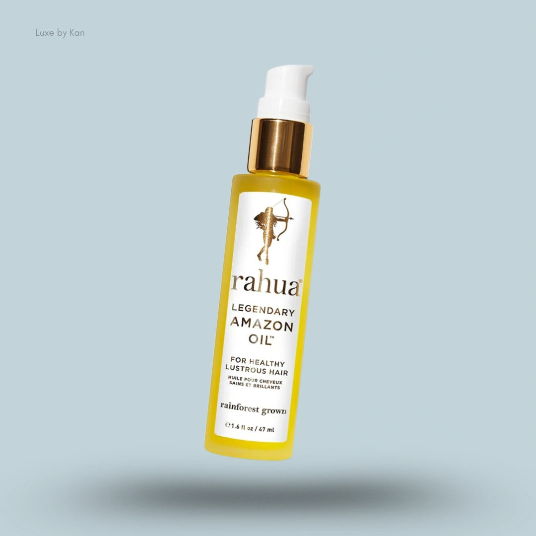 Rahua Legendary Amazon Oil in a yellow bottle with a white pump and gold accents.