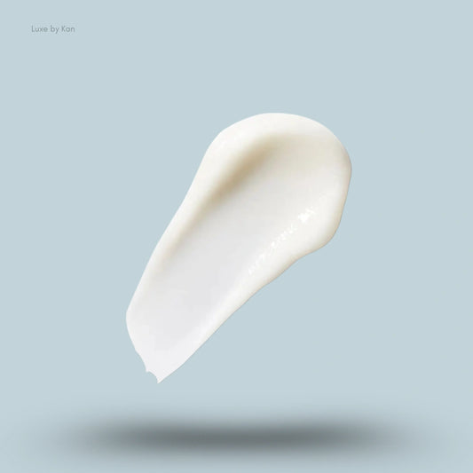 Close-up of a swipe of Rahua voluminous conditioner.