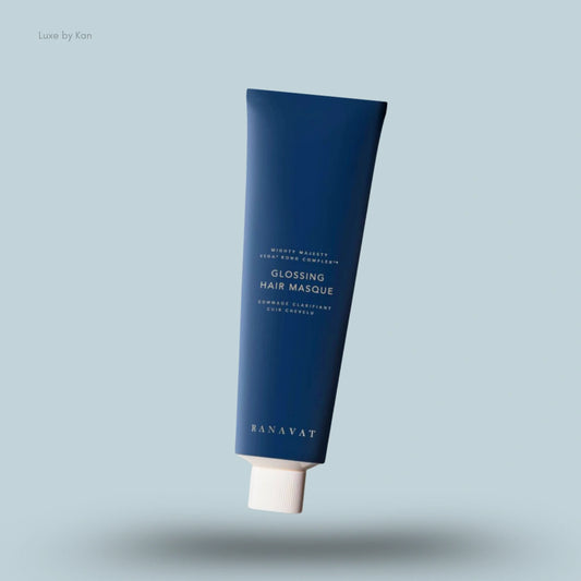 Ranavat Mighty Majesty glossing hair masque in a dark blue tube with a white cap.